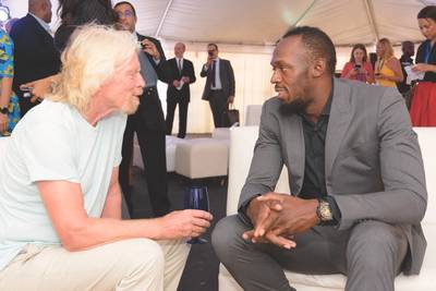 ريتشارد برانسون مع يوسين بولت (الصورة: مسرع المناخ الذكي لمنطقة الكاريبي)
