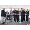 Cutting the ribbon, from left, Dominic Galluci, P&S Construction; RI Congressman James Langevin; RI Governor Lincoln Chafee; Rear Adm. Michael Jabaley, commander, NUWC; Capt. Todd Cramer, commander, NUWC Division Newport; Mark Rodrigues, head NUWC's Platform and Payload Integration Department; Blair Decker, General Dynamics/Electric Boat; and RI Senator Jack Reed.
