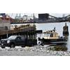 A District vehicle retrieves a survey vessel at the New York District's reconstructed Caven Point Marine Terminal in Jersey City, N.J., June 12, 2018. The new boat ramp enables launching and retrieving craft during all points in the tide cycle. A section of the Hydrogaphic Surveys class was taught aboard survey vessels on the water in New York-New Jersey Harbor. (Photo by James D'Ambrosio)