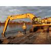 A dredging planning optimization model algorithm, developed by a data science team from the University of Houston and Rutgers weighs potential cost offsets when materials, such as sand, can be collected and repurposed. In this 2020 dredging, special equipment attached to the backhoe on the barge work boat redirected sand away from navigable areas. (Photo: U.S. Army Corps of Engineers)