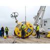 R/V Falkor (too) crew and Argentine science team prepare to deploy a Servicio de Hidrografía Naval’s Wavescan Oceanor Buoy, or WOB; the moored buoy collects data on currents as well as hydrographic and atmospheric parameters. © Schmidt Ocean Institute