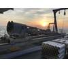 Figure 1: With the sun rising over the horizon, the coring rig sits ready for deployment. Image courtesy of A. Herre-ra- Schneider.