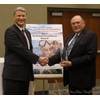 Jim Garrington receives the award from DCBC Chairman Jonathan Chapple (Photo: Shark Marine Technologies)