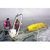 A Hugin AUV being launched (Courtesy Kongsberg)