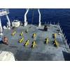 Naval Oceanographic Office personnel prepare to launch 10 littoral battlespace sensing gliders from USNS Maury in the Eastern Atlantic Ocean in support of NAVOCEANO's goal to deploy more than 50 gliders globally. These gliders are unmanned underwater vehicles used to collect data that is incorporated into ocean models, ultimately providing underwater forecasts for U.S. Navy operations. (Credit: Rebecca Shaw, Naval Oceanographic Office)
