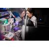 Sandia National Laboratories electrochemist Aliya Lapp prepares a sample of upcycled lithium battery cathode for testing. (Photo by Craig Fritz)