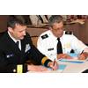 Signing the Agreement: Photo credit NOAA