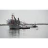 Tugs guide the Department of the Navy's Floating Instrument Platform (FLIP) from her berth at the Nimitz Marine Facility in Point Loma, Calif. (U.S. Navy photo by John F. Williams/Released)