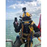  An MSDS Marine diver prepares to dive holding a Nano transponder. - Credit: Sonardyne