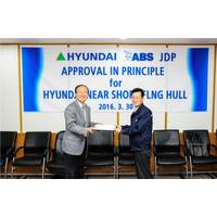 Andre Han, Vice President, Business Development in the ABS Pacific, Korea and Northern Region (left), presents Yun-Sik Lee, Executive Vice President, Shipbuilding Division at HHI, with a certificate acknowledging Approval i