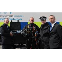 Andrew Winstanley, Sales Manager and Brian Hector, Technical Director from Bowtech Products hand system over to Inspector Colin MacAllister and PC Scott Duncan from Police Scotland Photo: Bowtech Products Ltd.