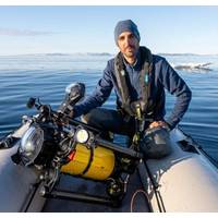 Antoine Drancey with the Boxfish Luna professional underwater drone on the boat. (Photo: Boxfish Robotics)
