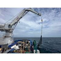 A crane was used to pull large marine debris, such as this ghost net, out of the water. © Sierra Sarkis/NOAA