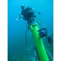 A diver completes the installation of Sentinel sonar heads and Scylla underwater loudhailers.
