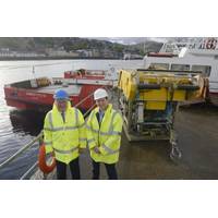 Energy Minister, Fergus Ewing (left), is pictured in front of one of The Underwater Centre’s new vessels and work-class ROV, with the Center’s General Manager, Steve Ham.