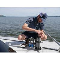 Ethan Edson of Ocean Diagnostics demonstrates some of his microplastic sensors. Credit: Ocean Diagnostics.