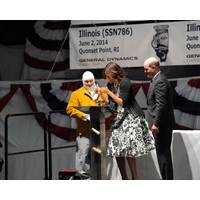 First Lady Michelle Obama, the sponsor for submarine Illinois, approves the weld of her initials, which is now permanently affixed in the ship. (Photo: General Dynamics Electric Boat)