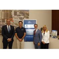 From left, Ryan Britton, FAU vice president for government relations and economic development; Barry Hinckley; president, Blue Ops; FAU President Adam Hasner; and Kelly Smallridge, president and CEO, Business Development Board of Palm Beach County. (Photo by Alex Dolce)