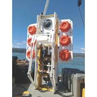 A hadal-class ocean lander, designed and built by the Universidad de Concepción (UdeC), Centro de Instrumentación Oceanográfica, is seen during buoyancy testing on the RV Kay-Kay in Dichato Bay, 38 kilometers north of the city of Concepción, in central Chile. The proximity and challenge of the Atacama Trench relentlessly draw UdeC engineers and scientists. Their ocean lander can downcast as a CTD-O in descent, remain in situ for extended periods on the trench floor, then upcast as a CTD-O/Rosett