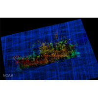 A 3-D image from NOAA Ship Fairweather multi-beam sonar. The profile of the F/V Destination is clearly visible, including the bulbous bow to the right, the forward house and mast, equipment (likely crab pots) stacked amidships, the deck crane aft, and the skeg and rudder. (Image: NOAA)