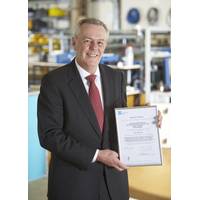 John Ramsden, Managing Director for Sonardyne, with Sonardyne Ltd.’s OHSAS 18001 certification