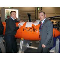 Kongsberg's Helge Uhlen and Andy Hoggarth from CARIS sign MOU at Oceanology International.