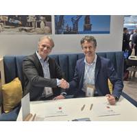 Mark Heine, Fugro CEO, (left) and Auden Berg, EVP, Kongsberg Discovery, sign the agreement at Oceanology International. © Kongsberg Discovery

