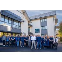 Members of the Valeport team outside the new Radcliffe House. Managing Director Matt Quartley and Financial Director Phill Harvey in the foreground. Image courtesy Valeport