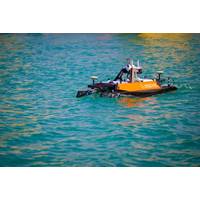 U.S. Naval Oceanographic Office conducts a hydrographic survey by launching an unmanned surface vessel, supported by a Bahrain Coast Guard escort, in the U.S. Central Command area of responsibility. Credit: Official U.S. Navy photo