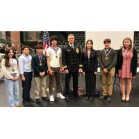 U.S. Navy Reservist Lt. Cmdr. Kevin Quinn (center) presents NUWC Innovation Awards to the winners of the R.I. State Science and Engineering Fair. Credit: U.S. Navy/Kevin Quinn