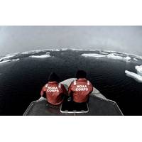 NOAA officers aboard one of the smaller survey vessels contemplate the vastness of the Chukchi Sea during the NOAA Ship Fairweather's reconnaissance survey in 2013. (Credit: NOAA)