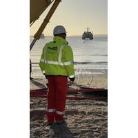 Pioneer Consulting team member oversees the landing of subsea cable. Credit: Pioneer Consulting.