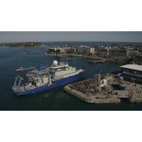 The research vessel Neil Armstrong was met by a jubilant crowd at the WHOI dock Wednesday, as it arrived to its homeport for the first time. (Photo by Daniel Cojanu, WHOI)