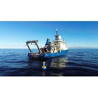 Researchers aboard WHOI’s R/V Neil Armstrong deploy ocean observing systems used to collect real-world environmental data in support of operational decision-making, modeling, and long-term ocean monitoring. © WHOI