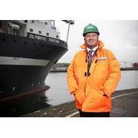 Roddy James, Director of Stork Technical Services Subsea, with the company’s chartered Olympic Triton vessel.