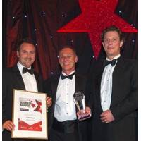 Saab Seaeye directors receive the two awards: Business of the Year and Excellence Through Innovation. Left to right, Mark Exeter, Operations Director; Matt Bates, Sales Director; Jon Robertson, Managing Director.