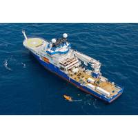 The science team recovers a glider after weeks of collecting data. During the expedition, two gliders provided continuous physical and biological data, including temperature, currents, dissolved oxygen, microstructure turbulence, and zooplankton presence. This process helped scientists select data-collection stations in near-real time. © Alex Ingle / Schmidt Ocean Institute