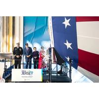 Ship's sponsor Susan DiMarco christens pre-commissioning unit New Jersey (SSN 796) during ceremony on Saturday, Nov. 13, 2021 at Newport News Shipbuilding. (Photo: HII)