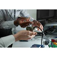 Silicon Sensing engineers working on an IMU prototype. © Silicon Sensing Systems