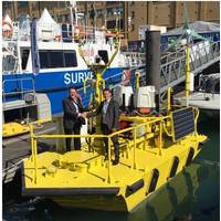 Terry Tarle, President & CEO of AXYS confirms deal with Ian Locker, MD of ZephIR LiDAR for the provision of dual ZephIR 300s on WindSentinel floating LiDAR buoy (Photo courtesy of AXYS Technologies Inc.)