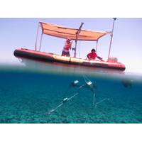 Vessels fitted with a swinging davit arm and winch are ideal for deploying and retrieving Baited Remote Undersea Video (BRUV) systems. In this photo, a Stereo-BRUV system, developed by the Australian Institute of Marine Science (AIMS), is lowered to the seafloor. BRUVs have minimal impact on seafloor communities or the seabed. Photo by Marine Ecology Group - Fish Research, The University of Western Australia