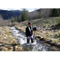 What: Hydrologist Measuring Streamflow When: 4/11/2014 Where: Smelterville, ID, USA Details: USGS hydrologist Greg Clark measures streamflow on Government Gulch Creek, a tributarty to the Coeur d’Alene River in northern Idaho. Streamflow data collected are included in the Coeur d’Alene Basin Environmental Monitoring Program the USGS conducts in cooperation with the Environmental Protection Agency. Credit: U.S. Geological Survey Department of the Interior/USGS U.S. Geological Survey/photo: De