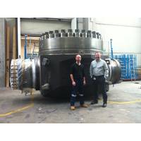 Wojciech Zmudzinski, Chief Pipeline Engineer for McDermott (right) with an INPEX Ichthys Project representative during a valve manufacturing inspection at a factory in Italy.