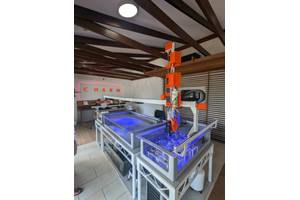 The CHARM coral farming robot, equipped with its new soft robotic hand, in action at the CHARM facility on Magnetic Island. (Source: CSIRO)