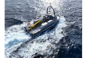 Exail has developed a modular LARS that can handle both AUVs and towed underwater vessels from an unmanned surface vessel. Credit: Exail