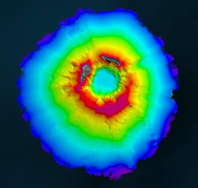 Aerial view of HT-HH, showing new multibeam depth data overlaid on a satellite image (Image courtesy Teledyne Geospatial)
