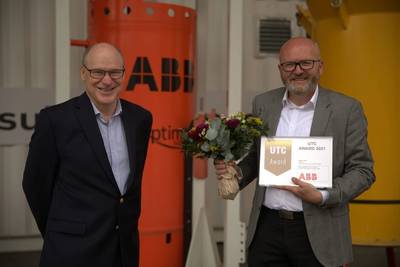 UTC Award jury chair Bjørn Søgård presents this year’s award to Svein Vatland, ABB's Vice President Subsea Technology Program