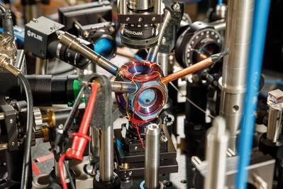 A compact device designed and built at Sandia National Laboratories could become a pivotal component of next-generation navigation systems. (Photo by Bret Latter) 