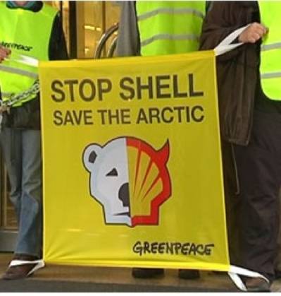 Protest banner: Image courtesy of Greenpeace