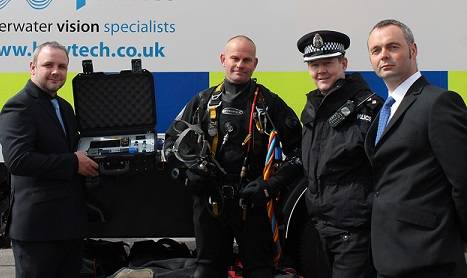 Andrew Winstanley, Sales Manager and Brian Hector, Technical Director from Bowtech Products hand system over to Inspector Colin MacAllister and PC Scott Duncan from Police Scotland Photo: Bowtech Products Ltd.